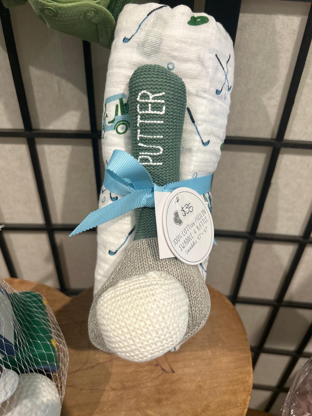 Golf swaddle and rattle sa