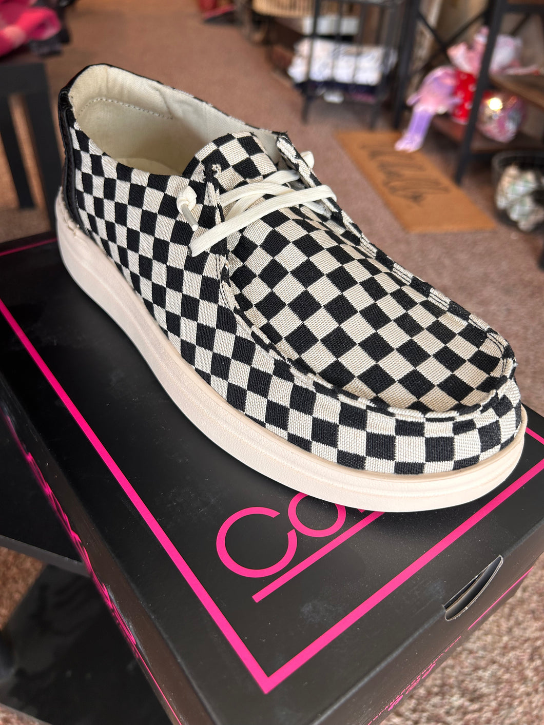 Black/white checkered Corky’s